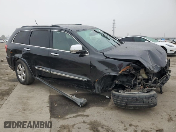 2013 Jeep Grand Cherokee Limited with VIN 1C4RJEBG5DC657005, listed as a Copart auction lot 84101024 with 124,055 mi miles and Salvage Title. Bid and sale history available at carsss.com. Image 4.