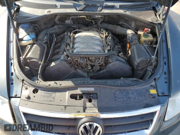 2005 Volkswagen Touareg 4.2L V8 z VIN WVGZM77L55D061960, wystawiony jako Copart lot #75717614 z przebiegiem 188 101 mil mil oraz Szkoda całkowita • Salvage title. Historia ofert i sprzedaży dostępna na DreamBid. Obrazek 12.