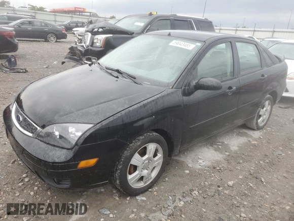 2005 Ford Focus S with VIN 1FAFP34N45W285454, listed as a Copart auction lot 59043485 with 165,071 mi miles and Salvage title. Bid and sale history available at DreamBid. Image 1.