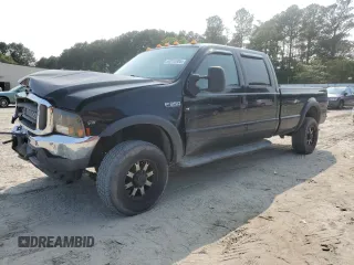 2002 Ford F-350 XL с VIN 1FTSW31S22EA86524, выставлен на аукционе Copart как лот 59212805 с пробегом 193 901 миль миль и Списание • Salvage title. История ставок и продаж доступна на DreamBid. Изображение 1.