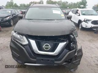 2017 Nissan Rogue SV with VIN KNMAT2MV1HP601384, listed as a IAAI auction lot 42454707 with 159,501 mi miles and . Bid and sale history available at DreamBid. Image 12.