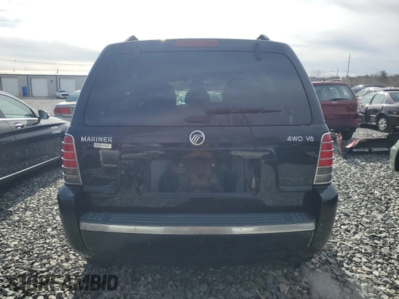 2005 Mercury Mariner Luxury z VIN 4M2CU57155DJ10663, wystawiony jako Copart lot #49102695 z przebiegiem 122 025 mil mil oraz Nie do naprawy. Historia ofert i sprzedaży dostępna na DreamBid. Obrazek 6.