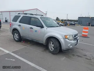 2010 Ford Escape XLT with VIN 1FMCU0DG4AKB30356, listed as a IAAI auction lot 41454995 with 166,247 mi miles. Bid and sale history available at carsss.com. Image 1.
