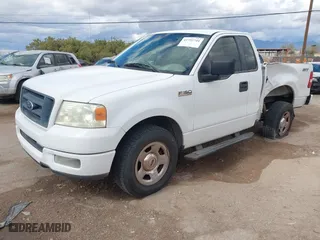 2005 Ford F-150 XL with VIN 1FTRF12W05NB36068, listed as a IAAI auction lot 41732744 with 203,261 mi miles. Bid and sale history available at carsss.com. Image 2.