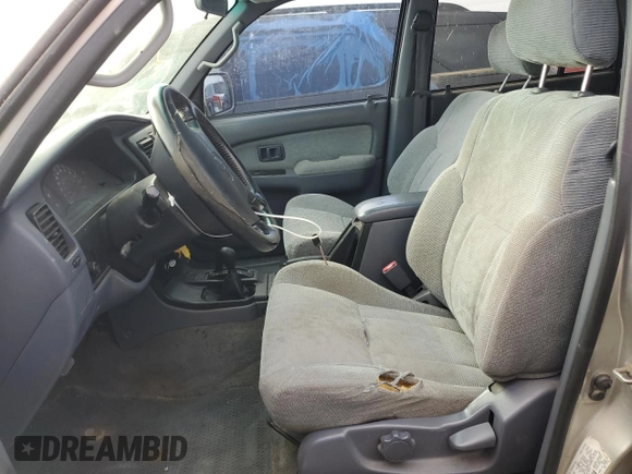 1999 Toyota 4Runner SR5 with VIN JT3HN86R2X0245132, listed as a Copart auction lot 77957964 with 241,861 mi miles and Clean title. Bid and sale history available at DreamBid. Image 7.