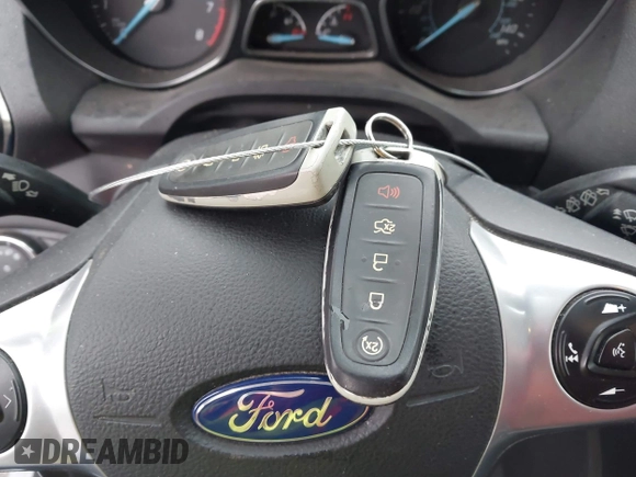 2015 Ford Escape Titanium with VIN 1FMCU9J97FUA84589, listed as a IAAI auction lot 41688156 with 129,073 mi miles. Bid and sale history available at carsss.com. Image 11.