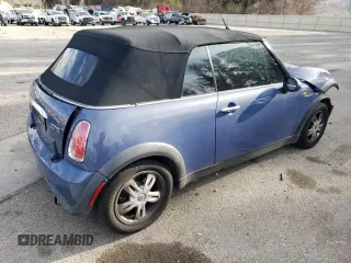 2007 MINI Convertible with VIN WMWRF33537TF66807, listed as a Copart auction lot 43664845 with 91,079 mi miles and Salvage Title. Bid and sale history available at DreamBid. Image 3.