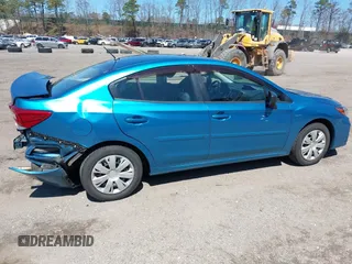 2019 Subaru Impreza z VIN 4S3GKAA61K3606040, wystawiony jako IAAI lot #41994415 z przebiegiem 89 780 mil mil oraz . Historia ofert i sprzedaży dostępna na DreamBid. Obrazek 13.