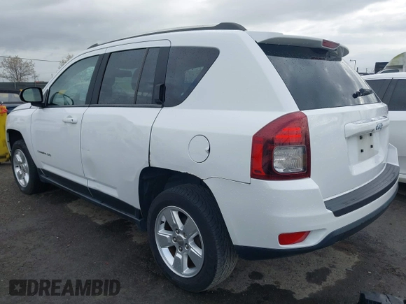 2014 Jeep Compass Altitude with VIN 1C4NJCBA8ED606589, listed as a IAAI auction lot 41939914 with 148,281 mi miles. Bid and sale history available at carsss.com. Image 3.