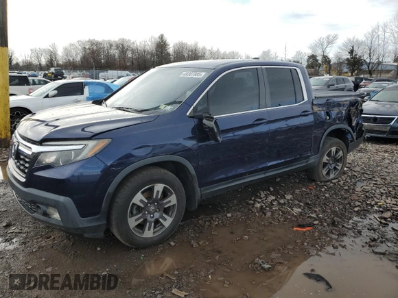 2017 Honda Ridgeline RTL with VIN 5FPYK3F57HB011597, listed as a Copart auction lot 49307885 with 140,157 mi miles and Salvage title. Bid and sale history available at DreamBid. Image 1.