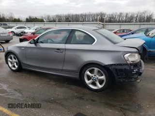 2009 BMW 1 Series 128i with VIN WBAUP93589VF48224, listed as a Copart auction lot 85687834 with 106,636 mi miles and Salvage title. Bid and sale history available at DreamBid. Image 2.