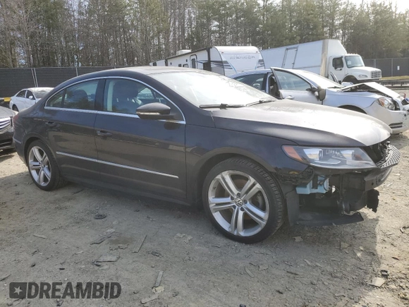 2015 Volkswagen CC Sport with VIN WVWBN7AN4FE814712, listed as a Copart auction lot 48027705 with 102,477 mi miles and Salvage Title. Bid and sale history available at DreamBid. Image 4.