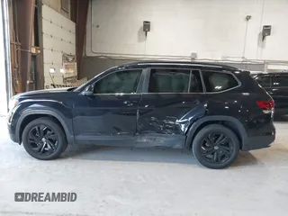 2022 Volkswagen Atlas SE z VIN 1V2KP2CA5NC509929, wystawiony jako IAAI lot #42231410 z przebiegiem 84 678 mil mil oraz . Historia ofert i sprzedaży dostępna na DreamBid. Obrazek 14.