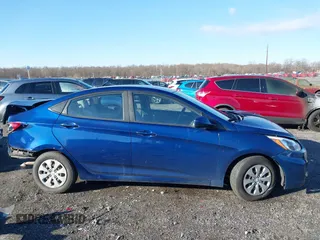 2015 Hyundai Accent GLS with VIN KMHCT4AE6FU916149, listed as a IAAI auction lot 41082268 with 153,219 mi miles. Bid and sale history available at carsss.com. Image 13.