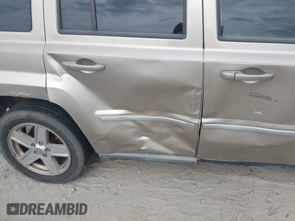 2010 Jeep Patriot Sport with VIN 1J4NF1GB9AD620237, listed as a IAAI auction lot 42079617 with 146,545 mi miles. Bid and sale history available at carsss.com. Image 13.
