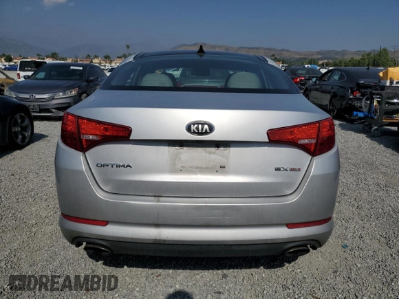 2013 Kia Optima EX with VIN 5XXGN4A7XDG165769, listed as a Copart auction lot 56940625 with 146,517 mi miles and Clean title. Bid and sale history available at DreamBid. Image 6.