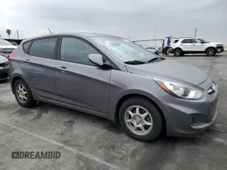 2014 Hyundai Accent GS with VIN KMHCT5AE4EU184401, listed as a Copart auction lot 54960195 with 135,134 mi miles and Clean Title. Bid and sale history available at carsss.com. Image 4.