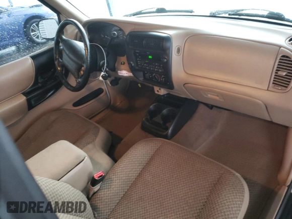 1999 Ford Ranger XLT with VIN 1FTYR14X3XPB21905, listed as a Copart auction lot 82248924 with 273,376 mi miles and Salvage Title. Bid and sale history available at DreamBid. Image 8.