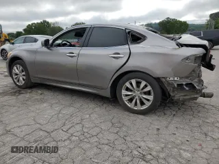 2013 Infiniti M with VIN JN1BY1AR2DM601965, listed as a Copart auction lot 62014215 with 134,047 mi miles and Salvage title. Bid and sale history available at DreamBid. Image 2.