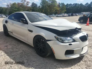 2014 BMW M6 z VIN WBSLX9C51ED160529, wystawiony jako Copart lot #76238844 z przebiegiem 57 557 mil mil oraz Szkoda całkowita • Salvage title. Historia ofert i sprzedaży dostępna na DreamBid. Obrazek 4.