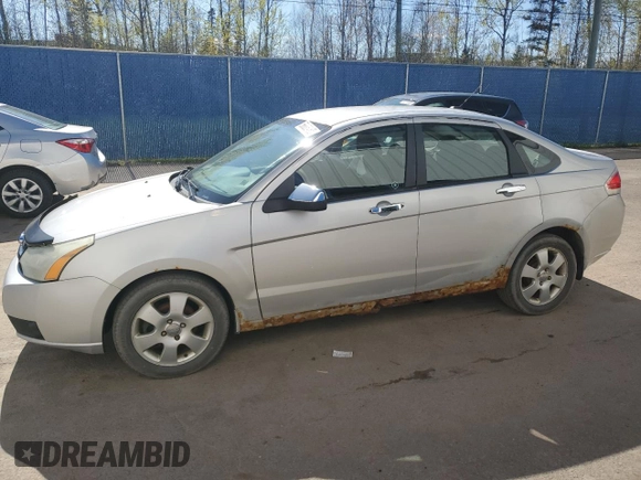 2009 Ford Focus SE z VIN 1FAHP35N29W126266, wystawiony jako Copart lot #56886465 z przebiegiem 420 672 mil mil oraz Czysty tytuł • Clean title. Historia ofert i sprzedaży dostępna na DreamBid. Obrazek 1.