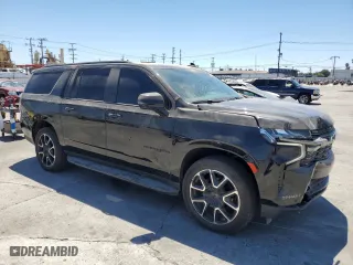2022 Chevrolet Suburban RST with VIN 1GNSCEKD7NR176874, listed as a Copart auction lot 67539544 with 73,624 mi miles and Salvage Title. Bid and sale history available at carsss.com. Image 4.