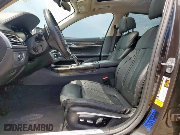2016 BMW 7 Series 740i with VIN WBA7E2C57GG714564, listed as a Copart auction lot 64005965 with 111,598 mi miles and Salvage title. Bid and sale history available at DreamBid. Image 7.