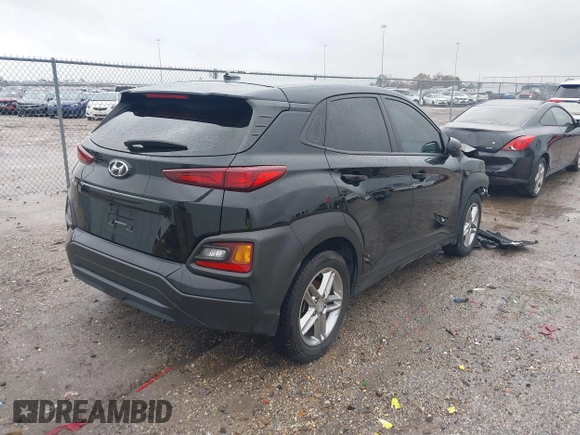 2018 Hyundai Kona SE with VIN KM8K12AA7JU128279, listed as a IAAI auction lot 41456296 with 100,977 mi miles and . Bid and sale history available at DreamBid. Image 4.