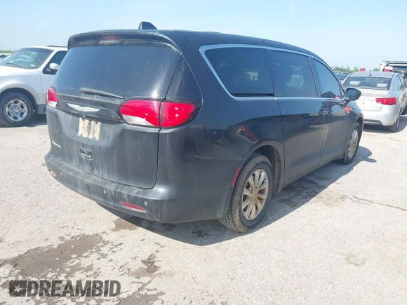 2017 Chrysler Pacifica Touring with VIN 2C4RC1DG6HR509717, listed as a IAAI auction lot 42228096 with 86,956 mi miles and . Bid and sale history available at DreamBid. Image 4.