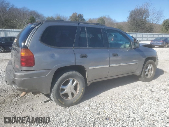 2006 GMC Envoy SLE with VIN 1GKDS13S662184697, listed as a Copart auction lot 80043434 with 196,077 mi miles and Salvage Title. Bid and sale history available at carsss.com. Image 3.