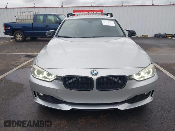 2014 BMW 3 Series 328i with VIN WBA3C1C58EK105766, listed as a IAAI auction lot 41692037 with 156,038 mi miles. Bid and sale history available at carsss.com. Image 12.