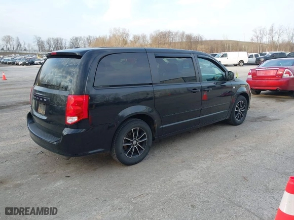 2014 Dodge Grand Caravan SE with VIN 2C4RDGBG1ER362169, listed as a IAAI auction lot 42011429 with 182,470 mi miles. Bid and sale history available at carsss.com. Image 4.