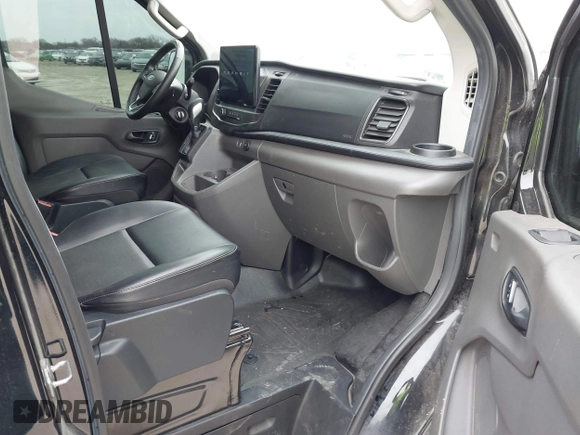 2023 Ford Transit Cargo with VIN 1FTYE1Y89PKB02836, listed as a IAAI auction lot 41736881 with 66,915 mi miles. Bid and sale history available at carsss.com. Image 5.