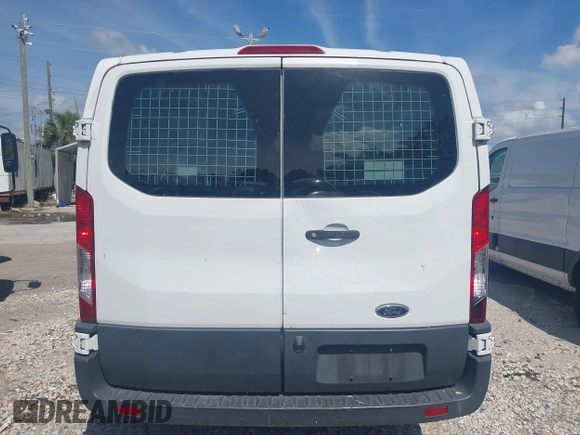 2018 Ford Transit with VIN 1FTYR1YM1JKA89833, listed as a IAAI auction lot 41833114 with 201,883 mi miles and . Bid and sale history available at DreamBid. Image 16.