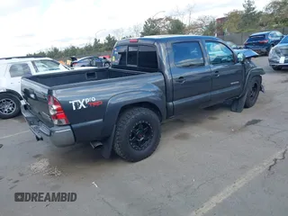 2011 Toyota Tacoma PreRunner with VIN 3TMJU4GN9BM110241, listed as a IAAI auction lot 41516056 with 181,951 mi miles and . Bid and sale history available at DreamBid. Image 4.