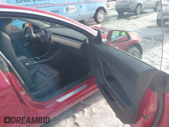 2018 Tesla Model 3 Long Range Battery with VIN 5YJ3E1EB0JF064041, listed as a IAAI auction lot 41562239 with 54,720 mi miles and . Bid and sale history available at DreamBid. Image 5.