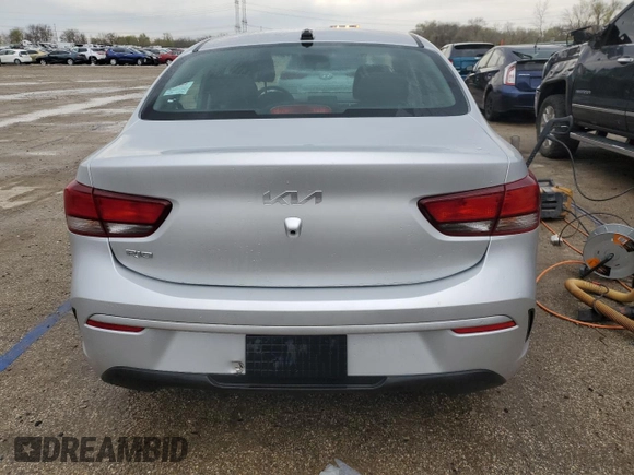 2023 Kia Rio S z VIN 3KPA24AD5PE516136, wystawiony jako Copart lot #52609525 z przebiegiem 52 379 mil mil oraz Szkoda całkowita • Salvage title. Historia ofert i sprzedaży dostępna na DreamBid. Obrazek 6.