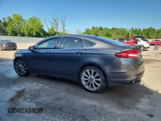 2017 Ford Fusion Titanium z VIN 3FA6P0D96HR251752, wystawiony jako Copart lot #61568705 z przebiegiem 173 479 mil mil oraz Nie do naprawy • Non repairable. Historia ofert i sprzedaży dostępna na DreamBid. Obrazek 2.