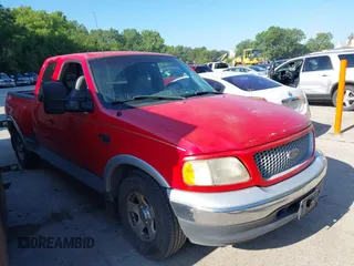 1999 Ford F-150 XL with VIN 2FTRX07W8XCA40584, listed as a IAAI auction lot 42551699 with Not provided miles and . Bid and sale history available at DreamBid. Image 1.