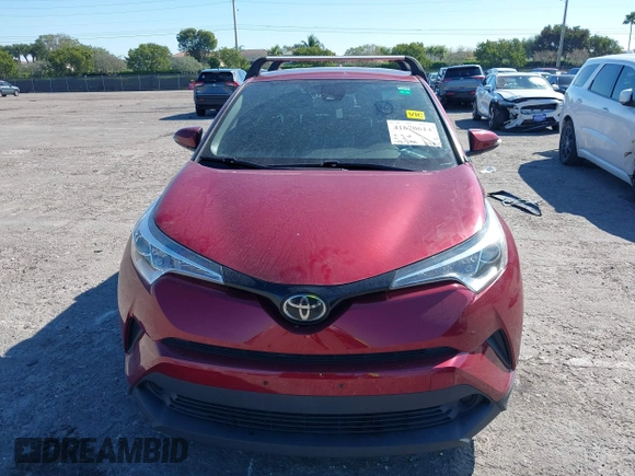 2019 Toyota C-HR XLE with VIN JTNKHMBX5K1044846, listed as a IAAI auction lot 41670614 with 52,374 mi miles. Bid and sale history available at carsss.com. Image 13.