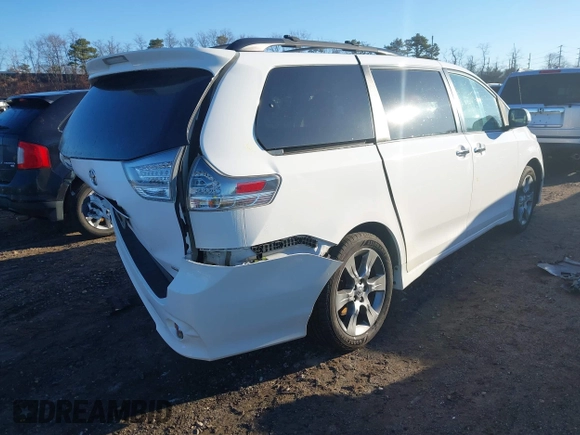 2014 Toyota Sienna SE with VIN 5TDXK3DC1ES503751, listed as a IAAI auction lot 41709975 with 229,771 mi miles and . Bid and sale history available at DreamBid. Image 4.