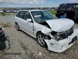 2002 Mazda Protege z VIN JM1BJ245721470434, wystawiony jako Copart lot #57293765 z przebiegiem 144 622 mil mil oraz Szkoda całkowita • Salvage title. Historia ofert i sprzedaży dostępna na DreamBid. Obrazek 13.