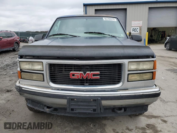 1997 GMC Suburban z VIN 1GKFK16R3VJ761305, wystawiony jako Copart lot #85785574 z przebiegiem 269 721 mil mil oraz Szkoda całkowita • Salvage title. Historia ofert i sprzedaży dostępna na DreamBid. Obrazek 5.