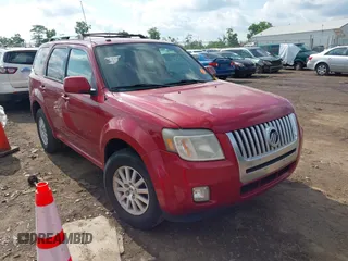 2011 Mercury Mariner Premier z VIN 4M2CN8HG1BKJ06957, wystawiony jako IAAI lot #42455616 z przebiegiem 206 388 mil mil oraz . Historia ofert i sprzedaży dostępna na DreamBid. Obrazek 1.