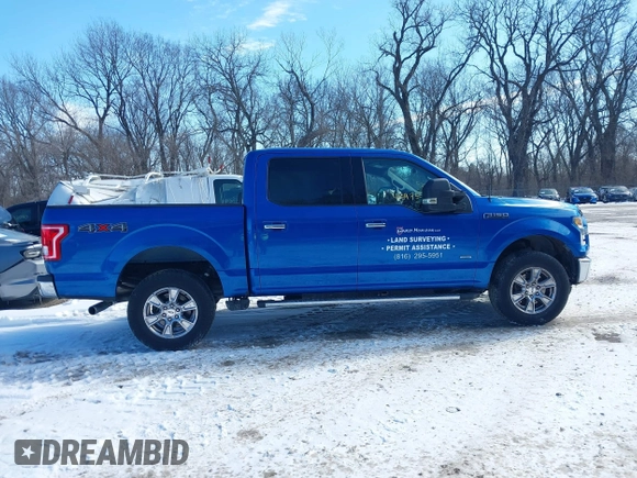 2015 Ford F-150 XLT with VIN 1FTEW1EG1FFA87638, listed as a IAAI auction lot 41597302 with 143,400 mi miles. Bid and sale history available at carsss.com. Image 14.