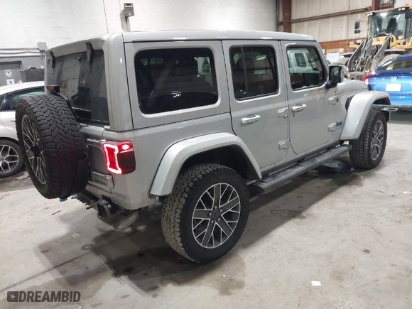 2024 Jeep Wrangler 4xe High Altitude with VIN 1C4RJXU6XRW218114, listed as a IAAI auction lot 41519843 with 17,317 mi miles. Bid and sale history available at carsss.com. Image 4.