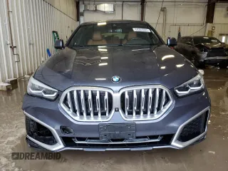 2021 BMW X6 xDrive40i z VIN 5UXCY6C07M9G36292, wystawiony jako Copart lot #44364665 z przebiegiem 86 359 mil mil oraz Szkody całkowita. Historia ofert i sprzedaży dostępna na DreamBid. Obrazek 5.
