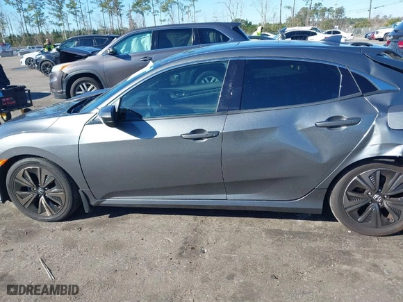 2017 Honda Civic Hatchback EX-L Navi with VIN SHHFK7H79HU208310, listed as a IAAI auction lot 41362349 with 52,740 mi miles. Bid and sale history available at carsss.com. Image 14.