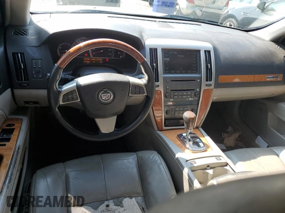 2008 Cadillac STS RWD z VIN 1G6DZ67A880189536, wystawiony jako Copart lot #71026144 z przebiegiem 178 958 mil mil oraz Szkoda całkowita • Salvage title. Historia ofert i sprzedaży dostępna na DreamBid. Obrazek 8.