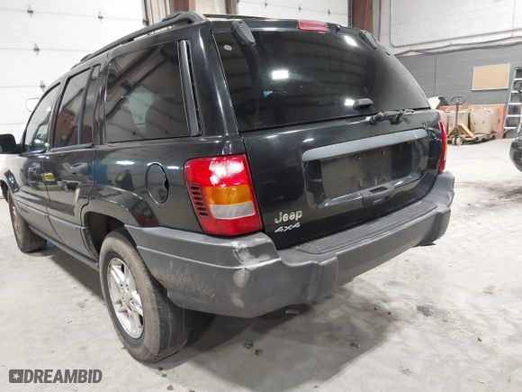 2003 Jeep Grand Cherokee Laredo with VIN 1J4GW48S63C552366, listed as a IAAI auction lot 41861501 with 227,464 mi miles. Bid and sale history available at carsss.com. Image 13.